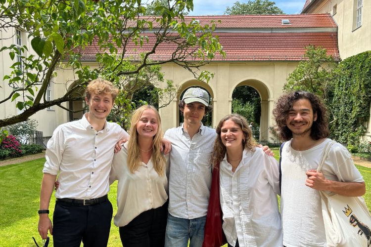 Group of students in the ESCP Berlin Campus Courtyard
