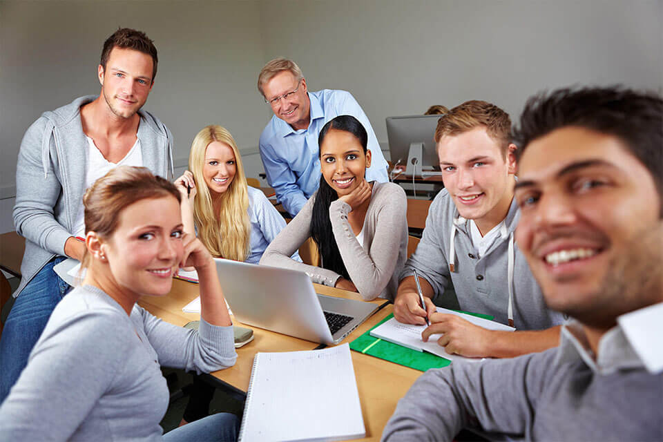 Office coworkers smiling and working together, ESCP Office coworkers smiling and working together, ESCP