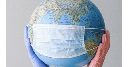 Image of hands holding globe